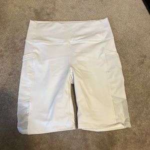 White high waisted shorts with mesh side panels